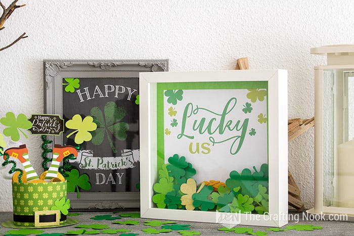 The St. Patrick's Day Shadow Box on my mantel with the favor box and a cute Print art.