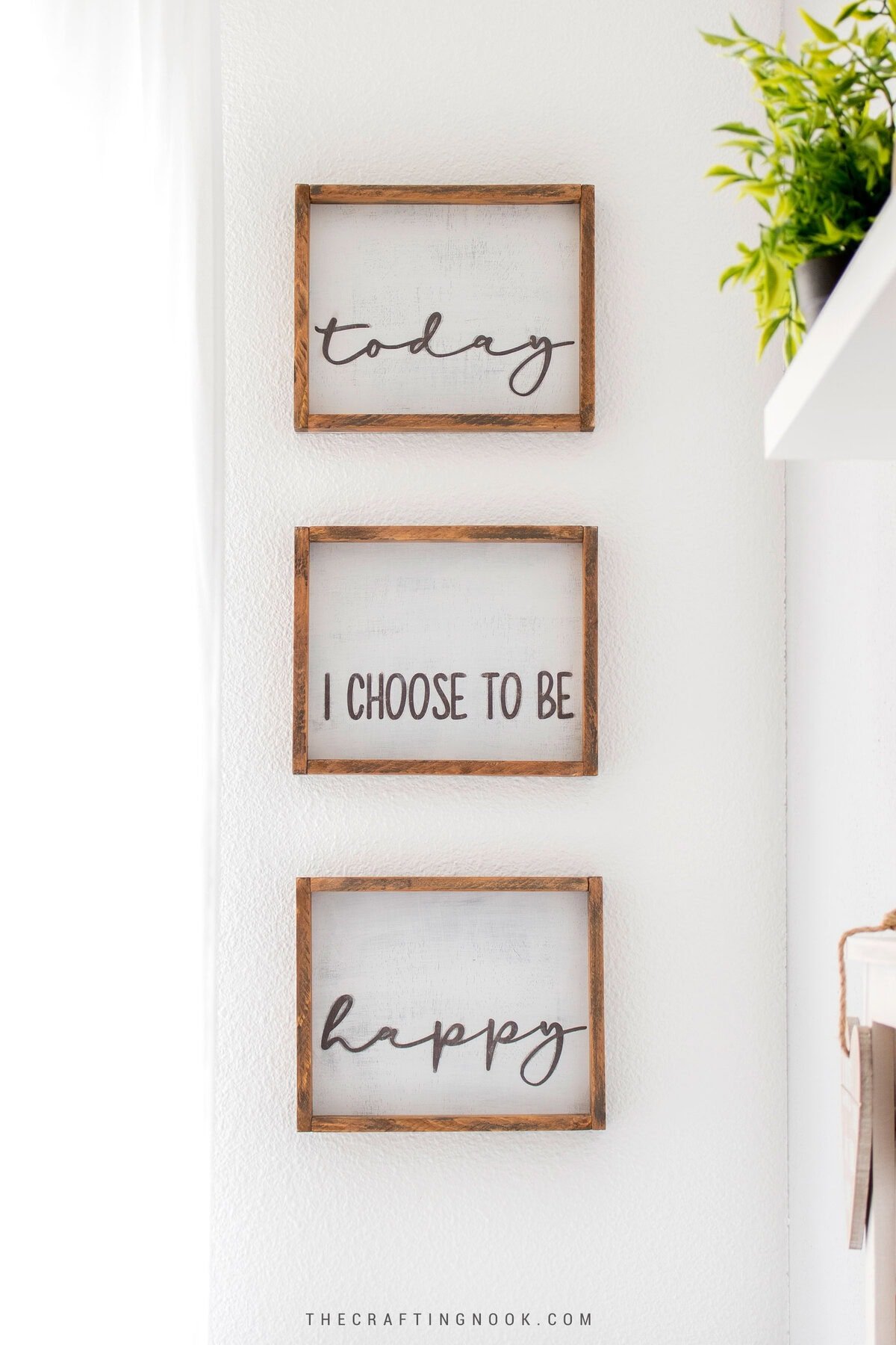 How to Make DIY Wood Signs with a Farmhouse Look. Wall art trio hanging on the wall vertically