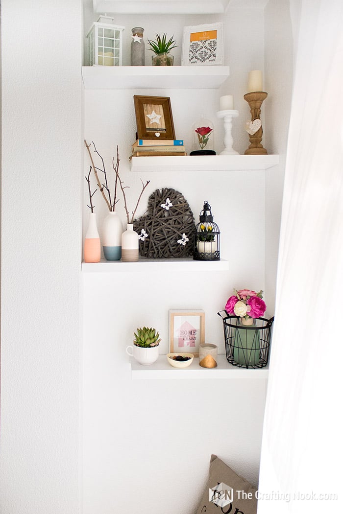 view of shelves decorated with various elements