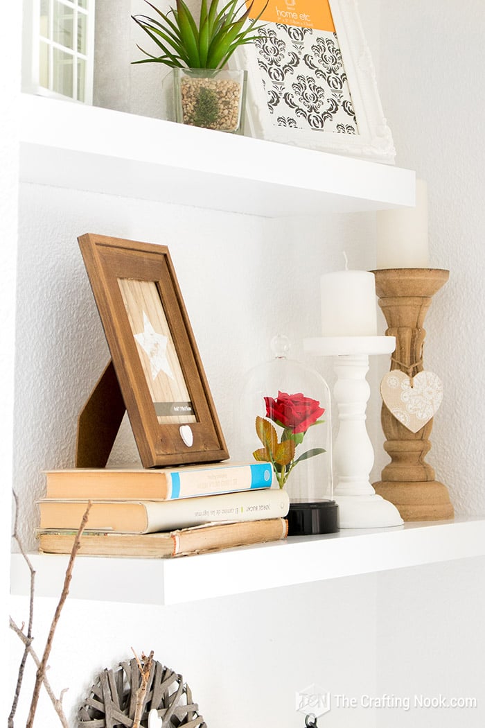 showing some decorative elements such as old books, rustic picture frames, etc.