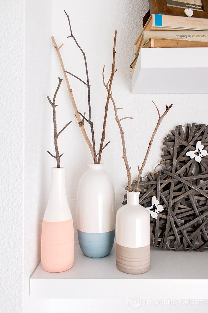 close up view of dry branches in farm house style vase