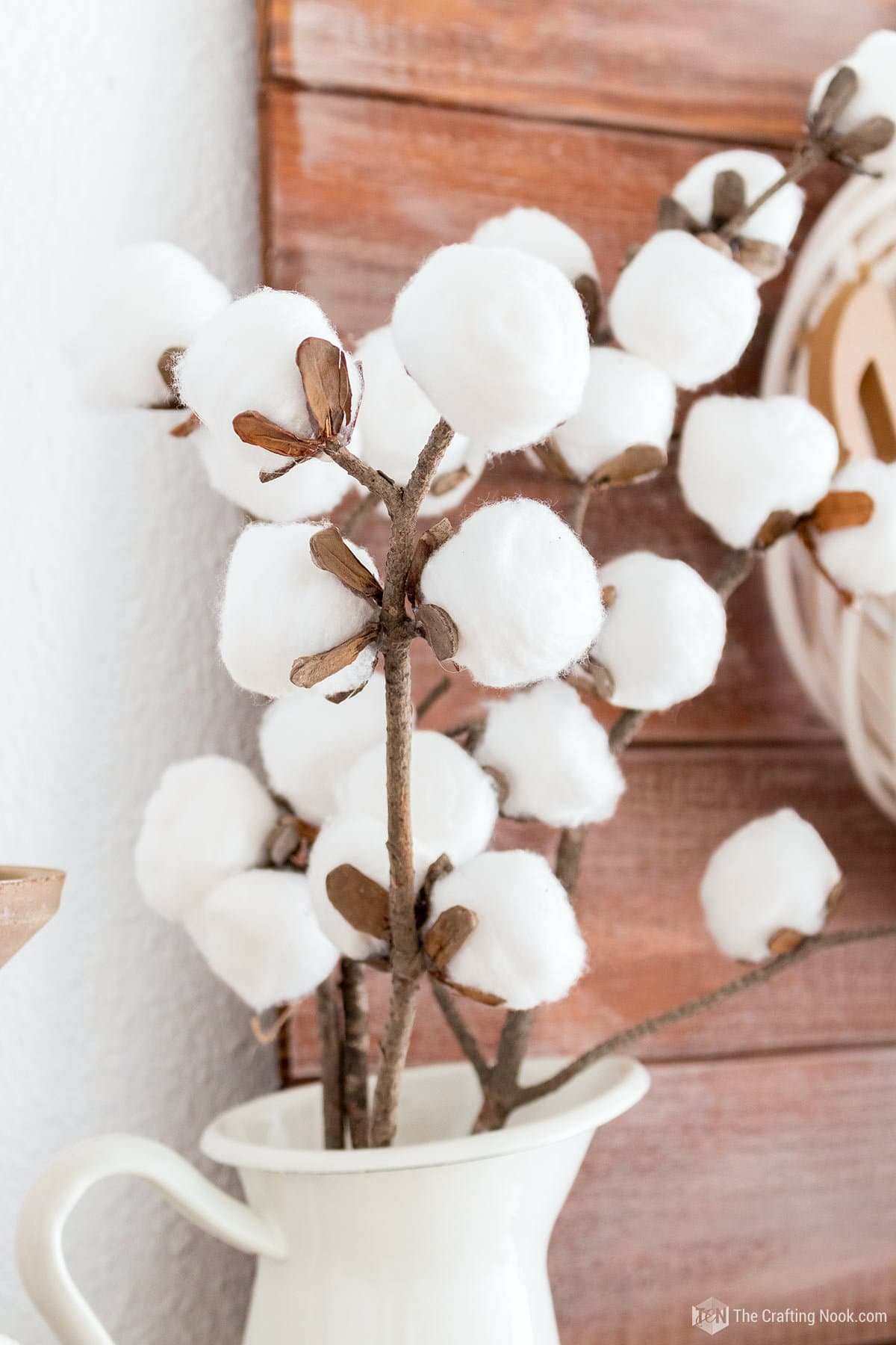 Closeup of a bouquet of Faux DIY Cotton Stems (In a few Simple Steps) placed in a jar