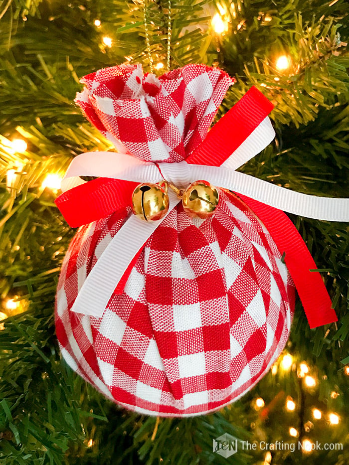 closer view of DIY Buffalo Check Christmas Ornament on christmas tree