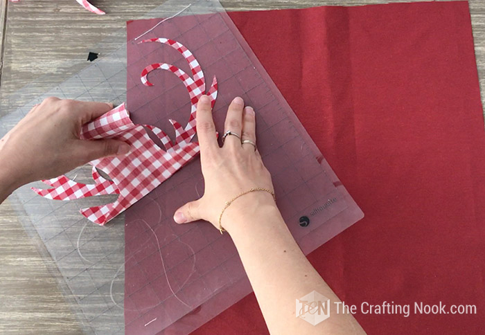 DIY Reindeer Applique Plaid Christmas Pillows - The Crafting Nook