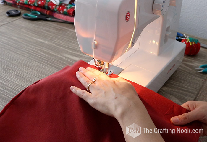 Sewing the edges of the fabrics so that they are together