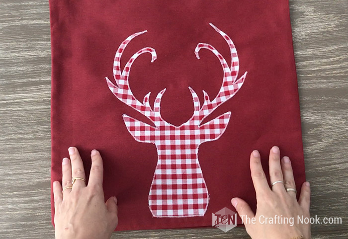 DIY Reindeer Applique Plaid Christmas Pillows - The Crafting Nook