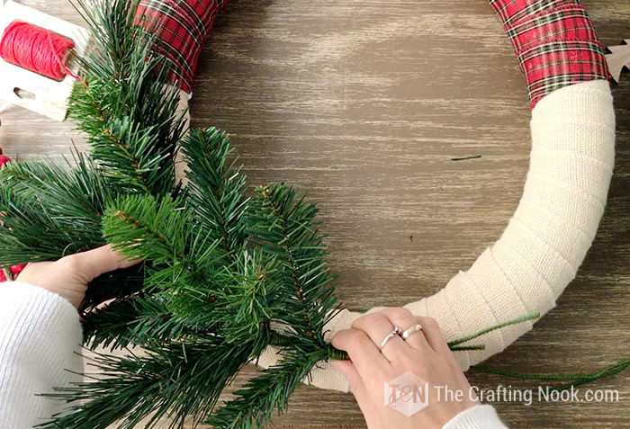 placing  tree springs over the base light beige fabric