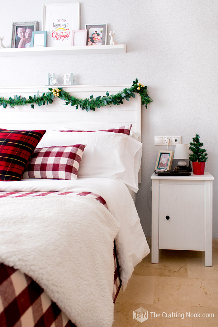 detailed view of one side of the bed and nightstand