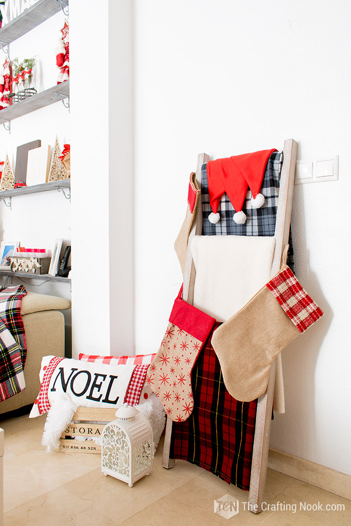 Red and White Buffalo Plaid Christmas ladder with christmas blankets