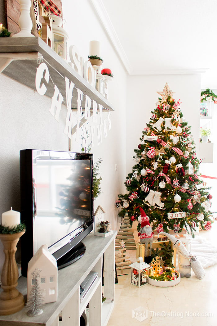 view of Christmas tree with red and White Buffalo Plaid decoration