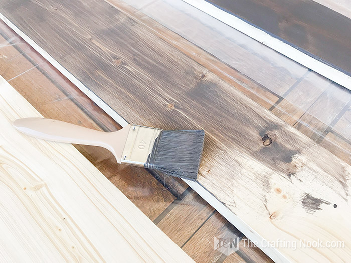 Staining the wood with grey paint