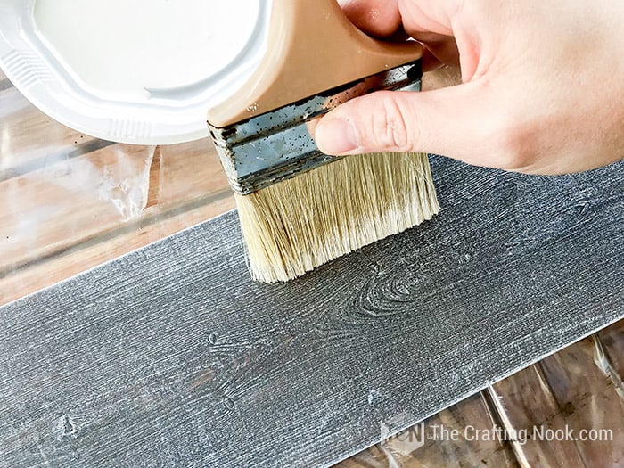 Dry brush painting across the wood grain