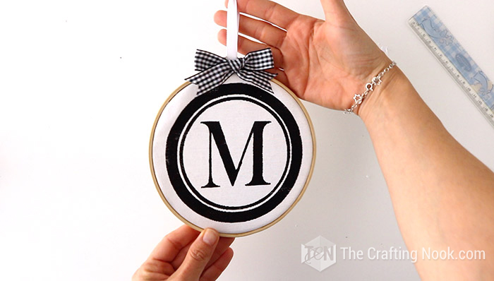 one of the monogrammed embroidery hoop ornaments finished on my hands