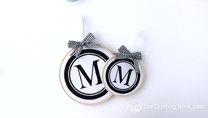 two different sizes of the DIY Monogrammed embroidery hoop ornaments