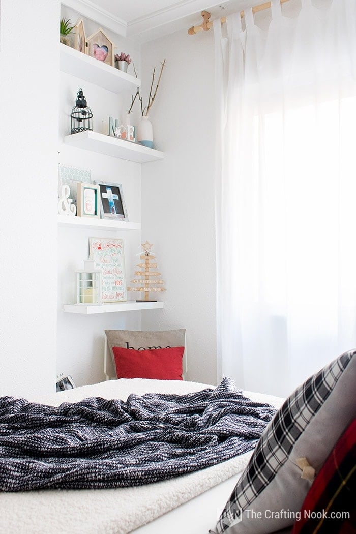 room wall with decorated shelves
