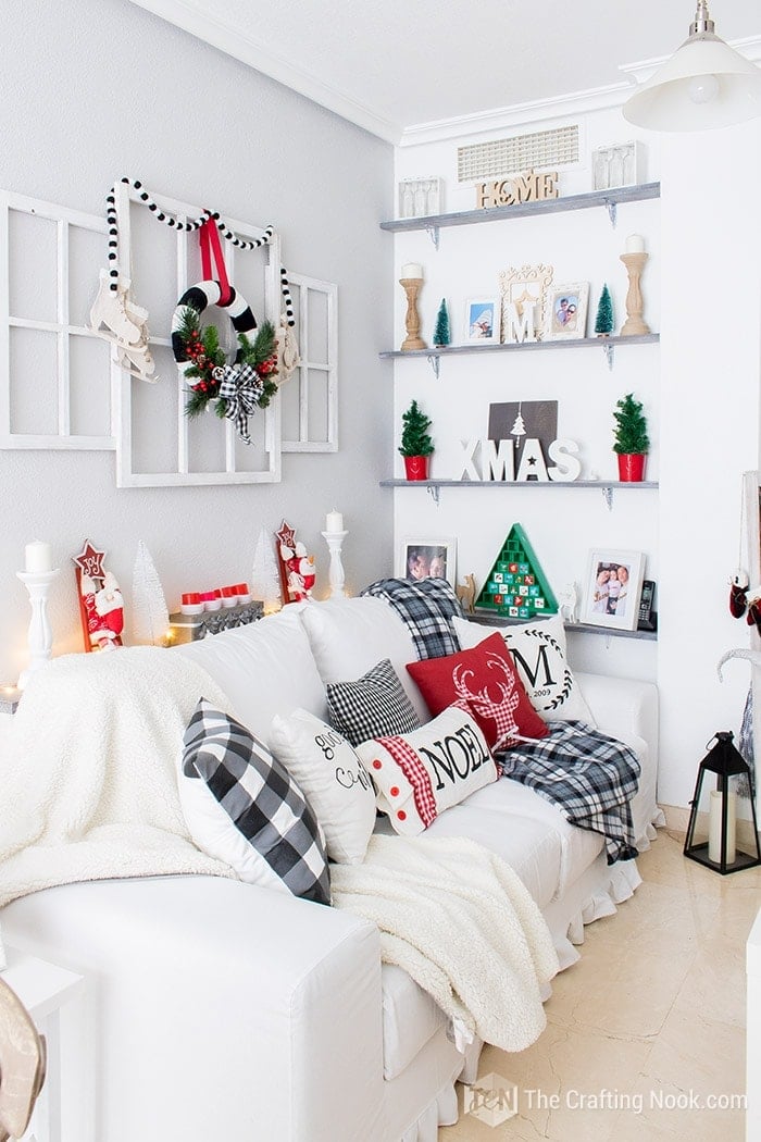 other view of sofa in living room with christmas decoration  