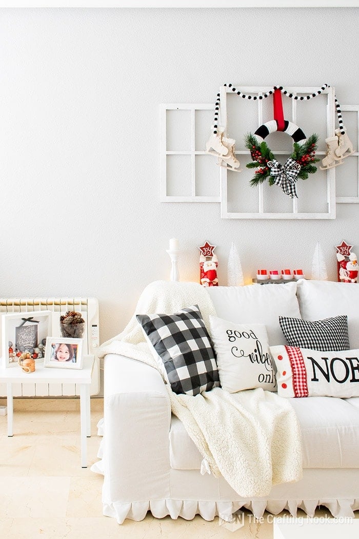 other view of sofa in living room with christmas decoration  