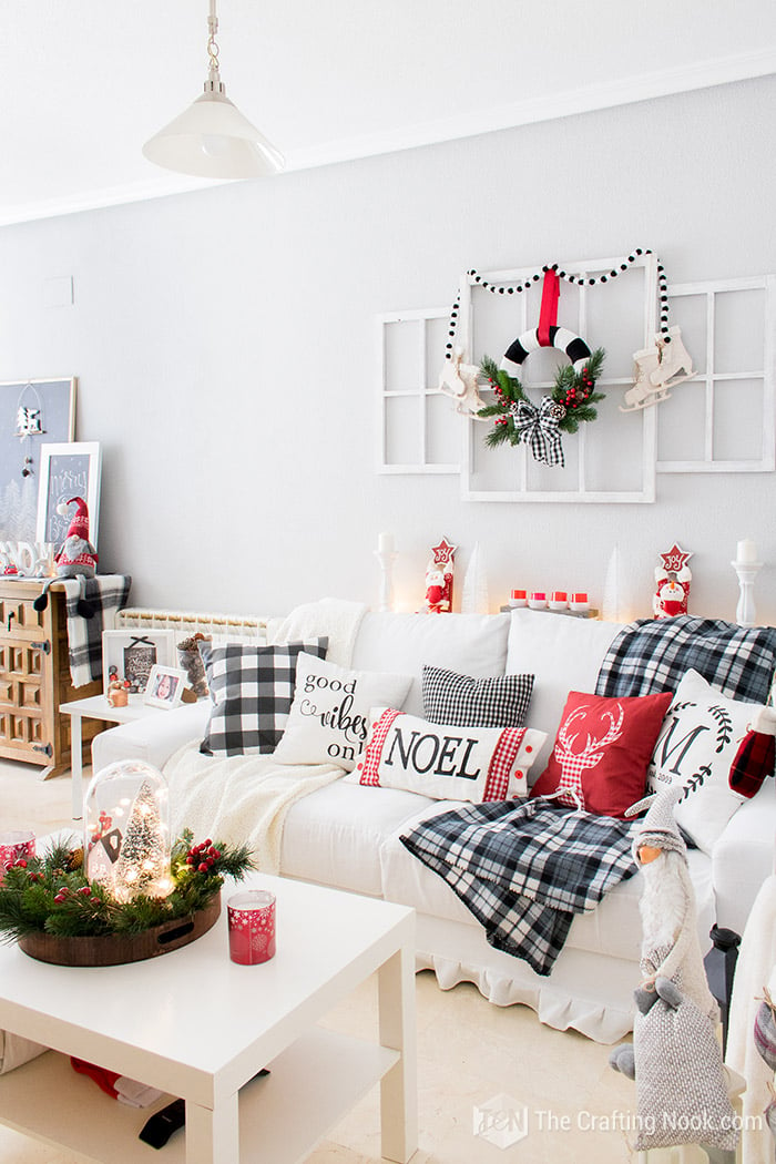 general view of sofa in living room with christmas decoration  