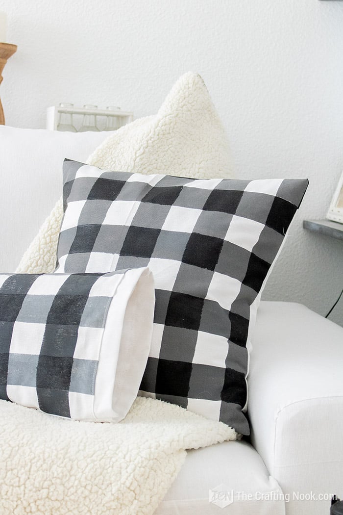 detailed of cushions lined with Buffalo Check on Fabric 