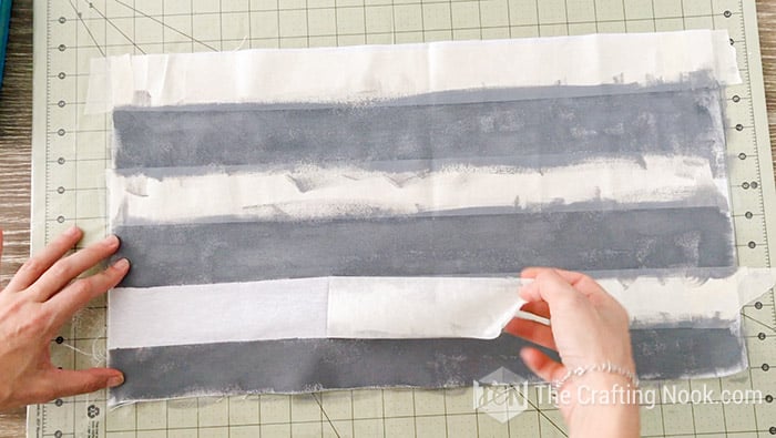 removing the tape from the fabric