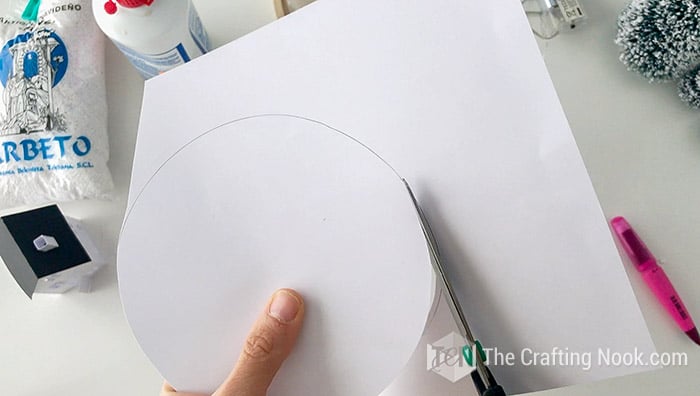 cutting the cardboard circle