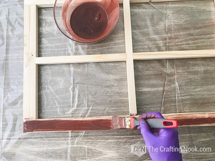 painting the frame in brown color