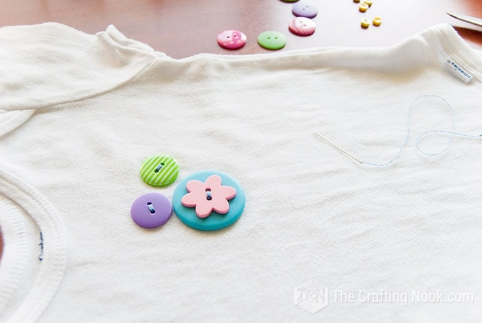 DIY Flower Button Decorated Onesie for Babies. - The Crafting Nook