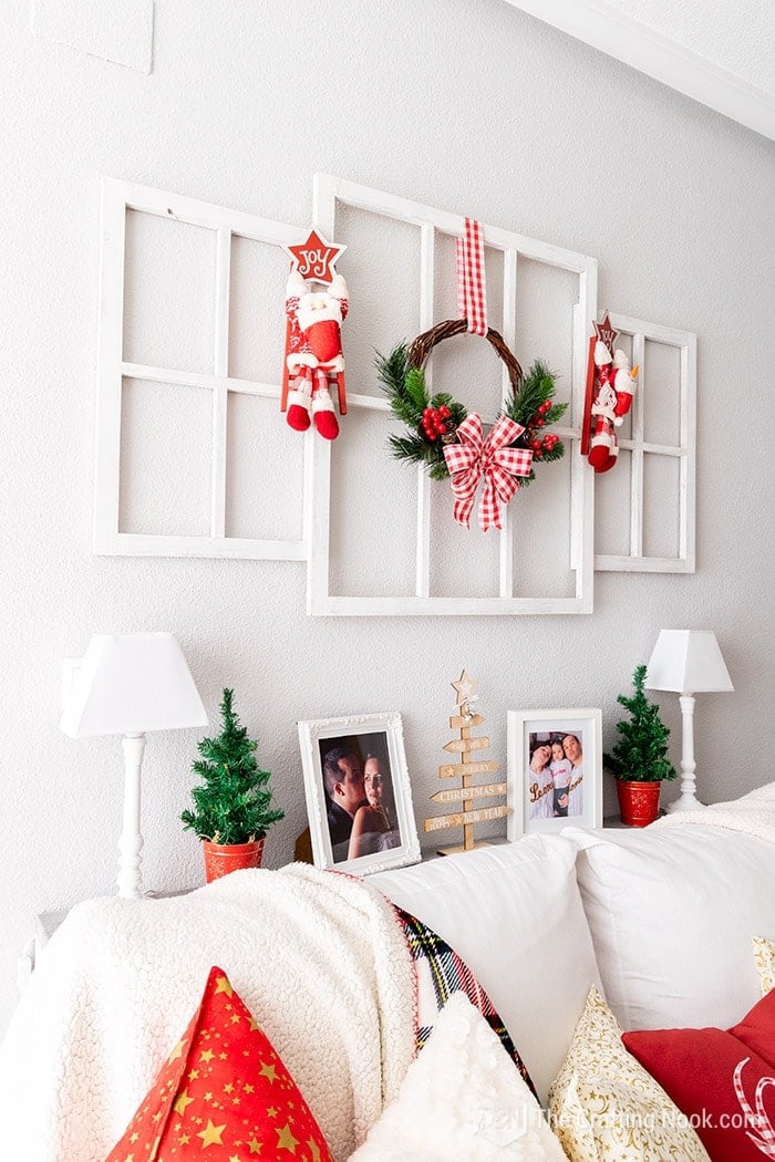 Side view of the DIY Rustic Christmas Wreath on the wall hanging from the window frame