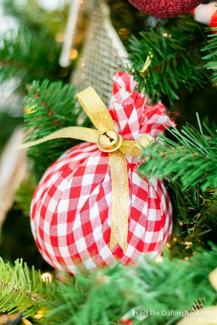 close up of red and white buffalo check ornaments