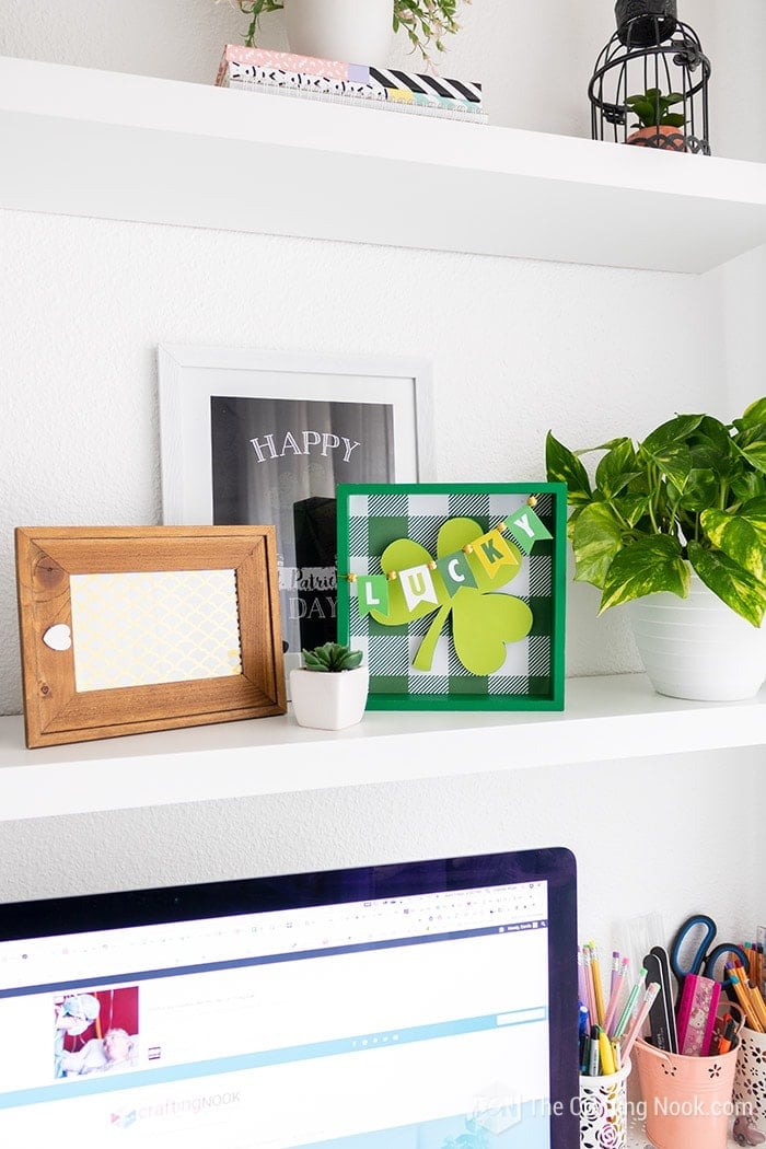 view of Lucky Shamrock Frame f on shelf