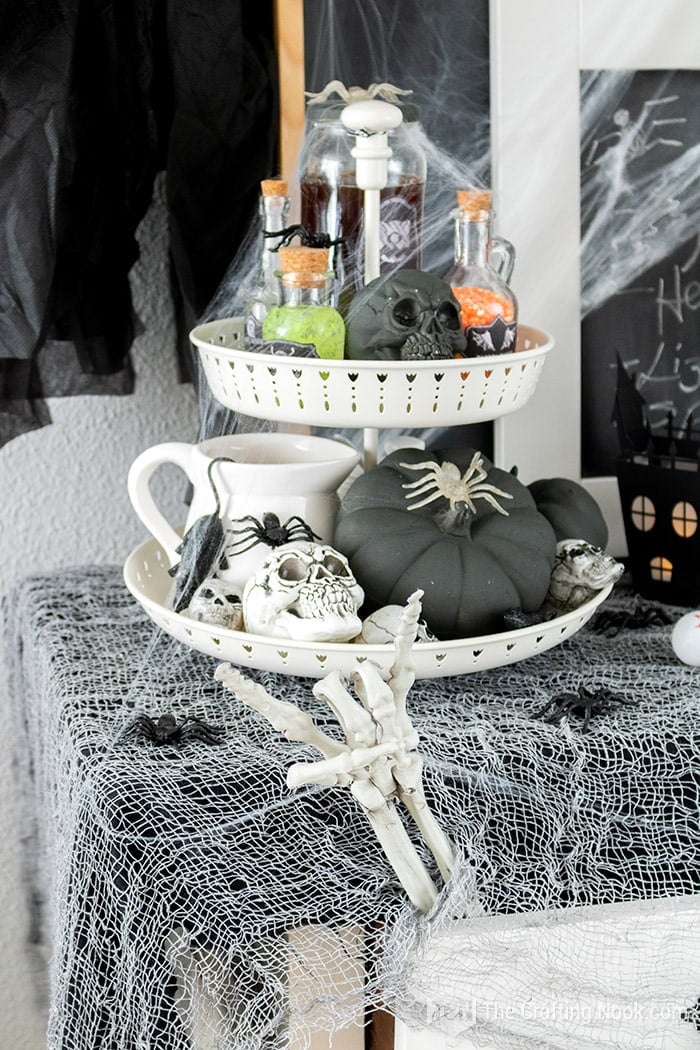 close view of two tiers trays with halloween decoration