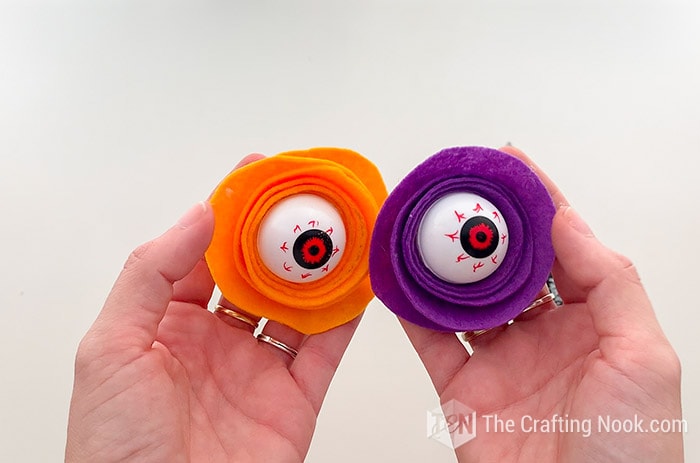 purple and orange felt eyeballs flowers