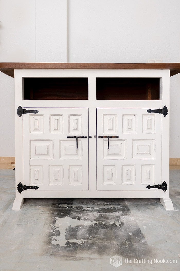 Vintage buffet stained the top with walnut wood stain white chalk paint for the bottom.