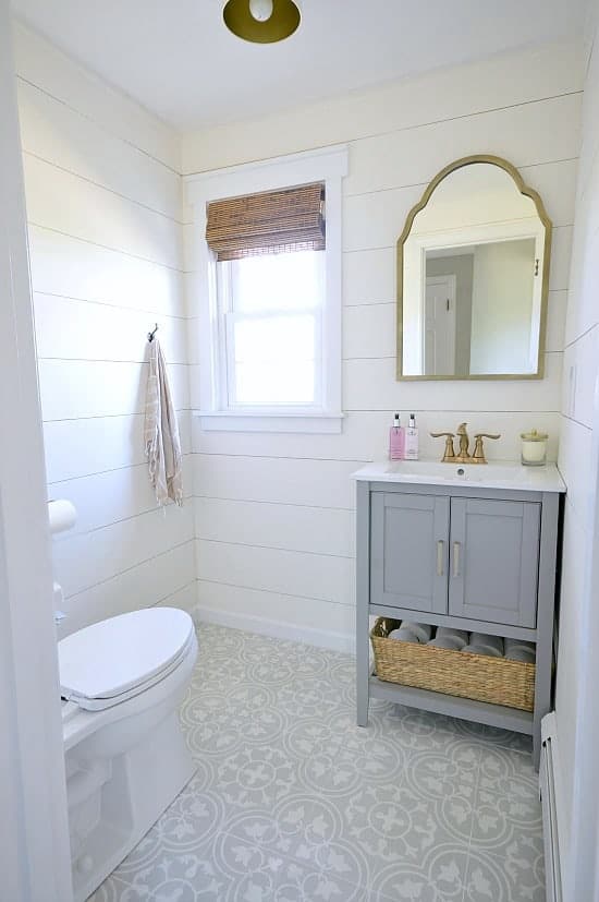 Tiny Bathroom Decorating Ideas: Gold brass faucet, gorgeous sink on vanity, and new flooring.