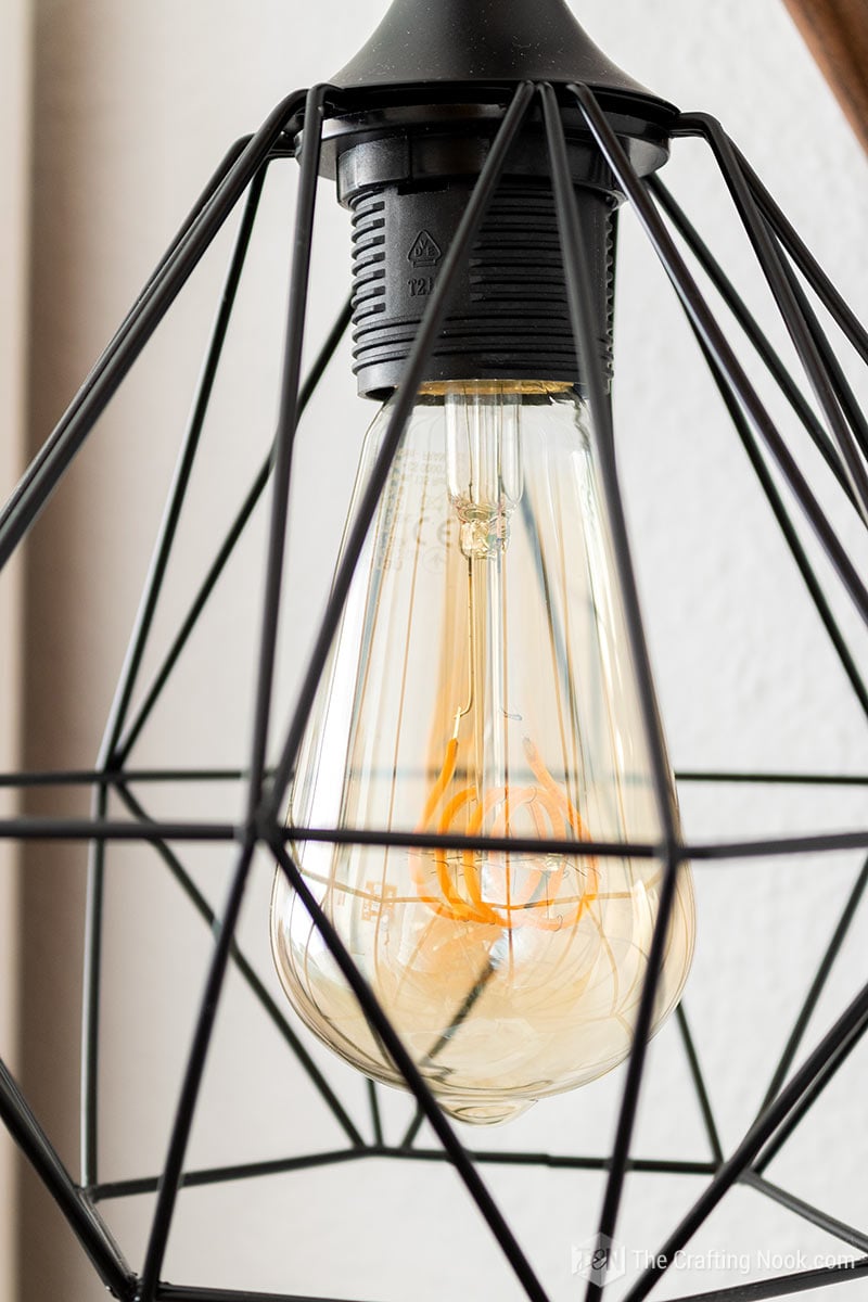 A closeup of the vintage light bulb