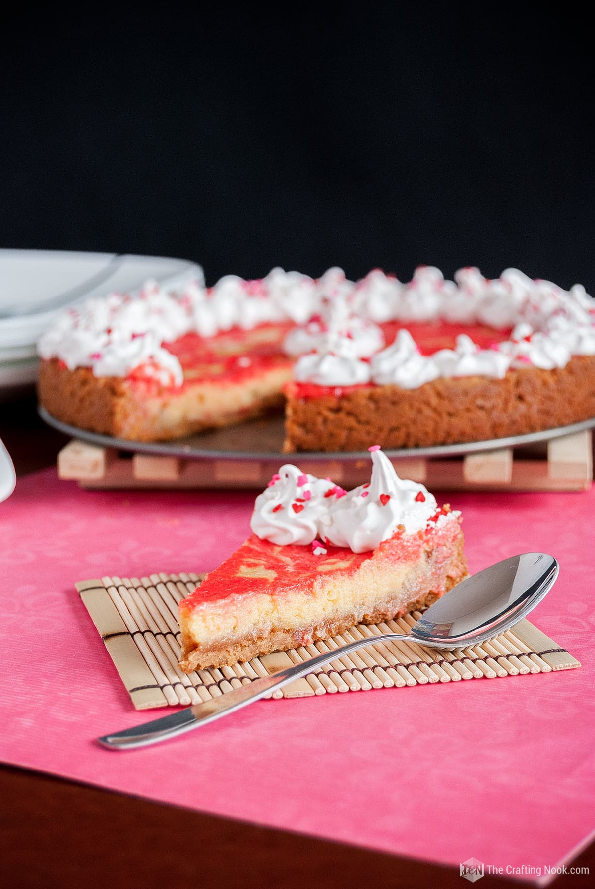 Cherry Lime Pie Recipe served a slice with cute meringue peaks and sprinkles