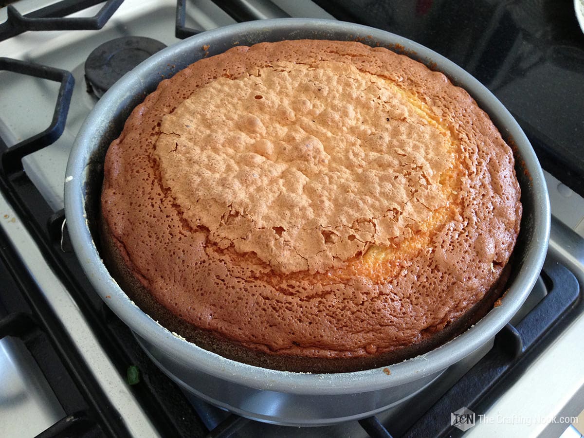 the orange cake coming out of the oven resting