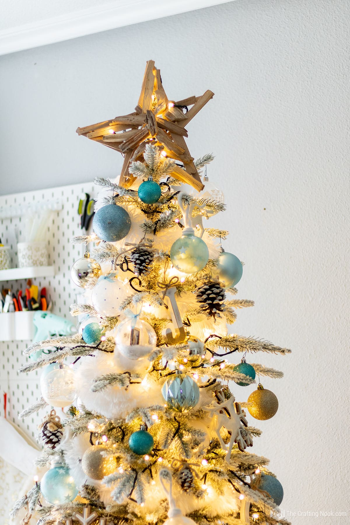 general view of wooden Christmas star on top of the tree