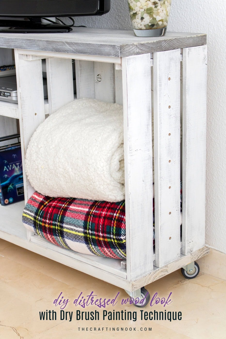 Distressed wood furniture with dry brush painting technique for rustic decor.