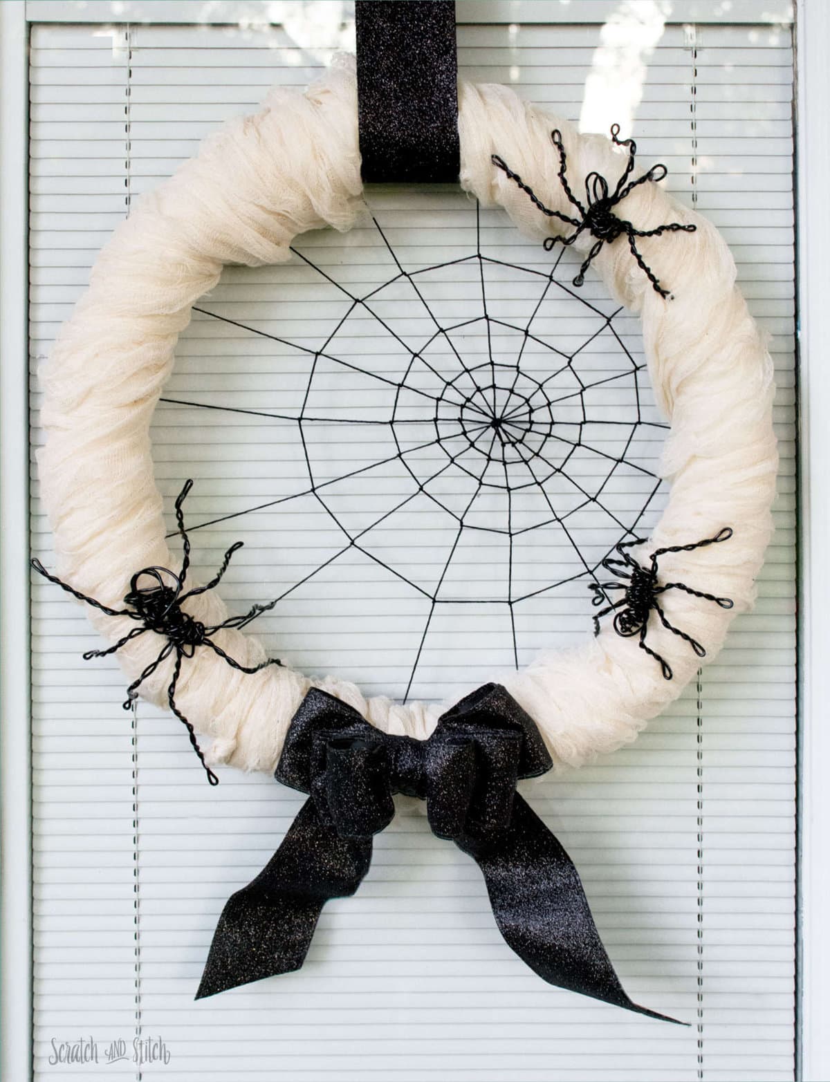 Diy Spiderweb Halloween Wreath With Wire Spiders by Scratch & Stitch