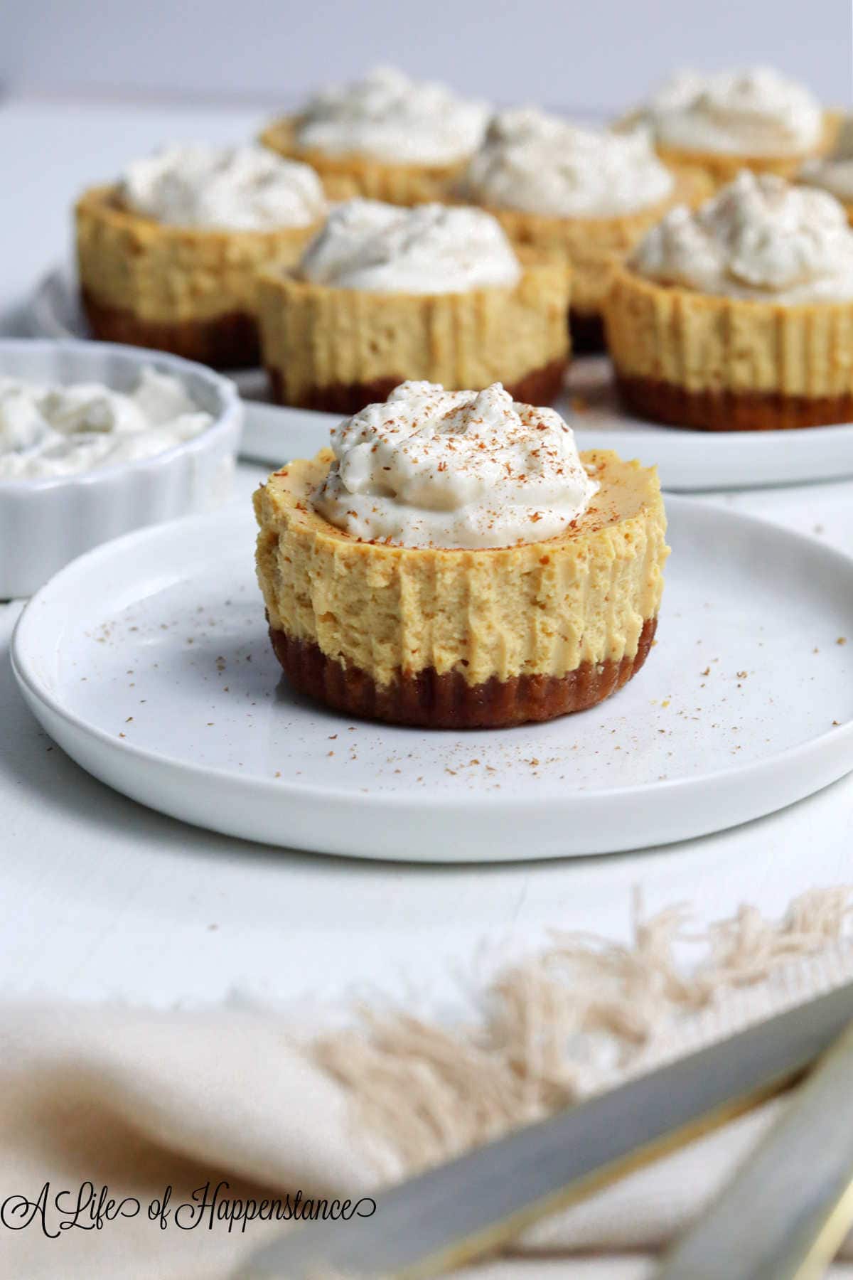 Mini Pumpkin Cheesecakes by The Helthier Bite