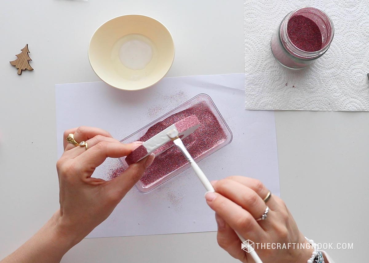 Applying glue to the rest of the letter side edges