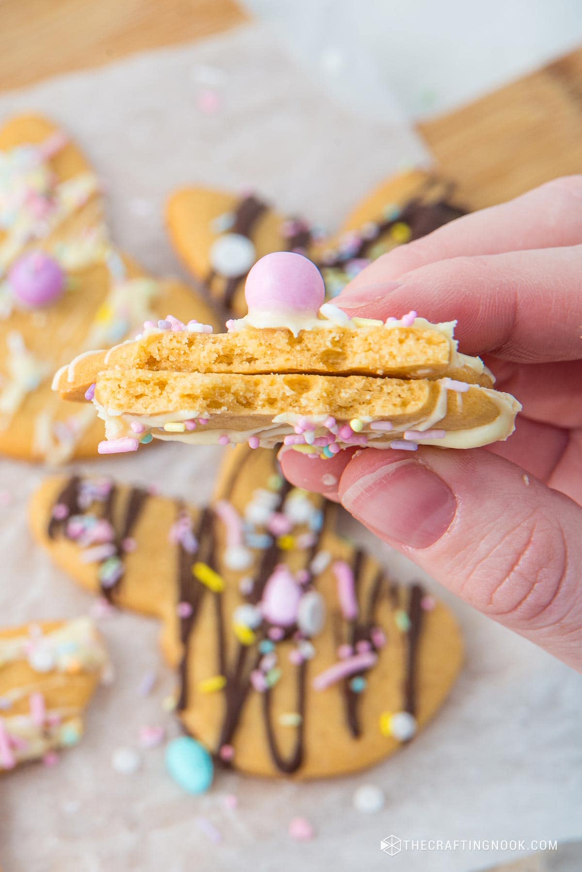 Easy Easter Bunny Cookies drizzle with white chocolate cracked in half