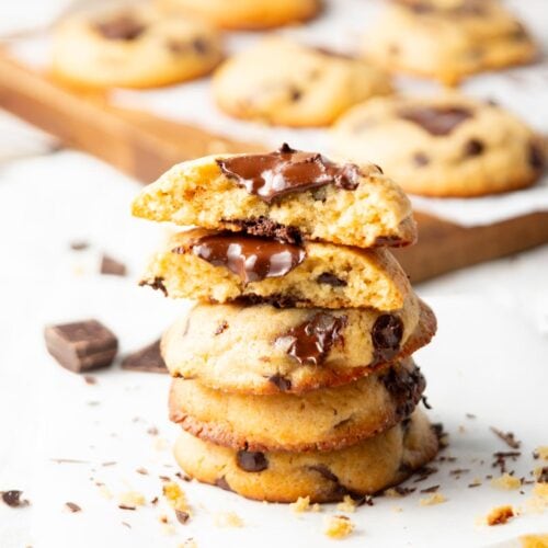 Small Batch Chocolate Chip Cookies Recipe. The cookies are piled up and the 2 last ones are cracked in half. Cover image.