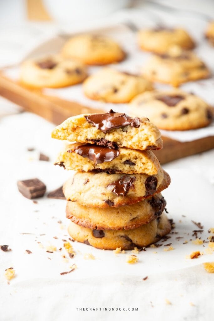 Small Batch Chocolate Chip Cookies Recipe. The cookies are piled up and the 2 last ones are cracked in half. Cover image.