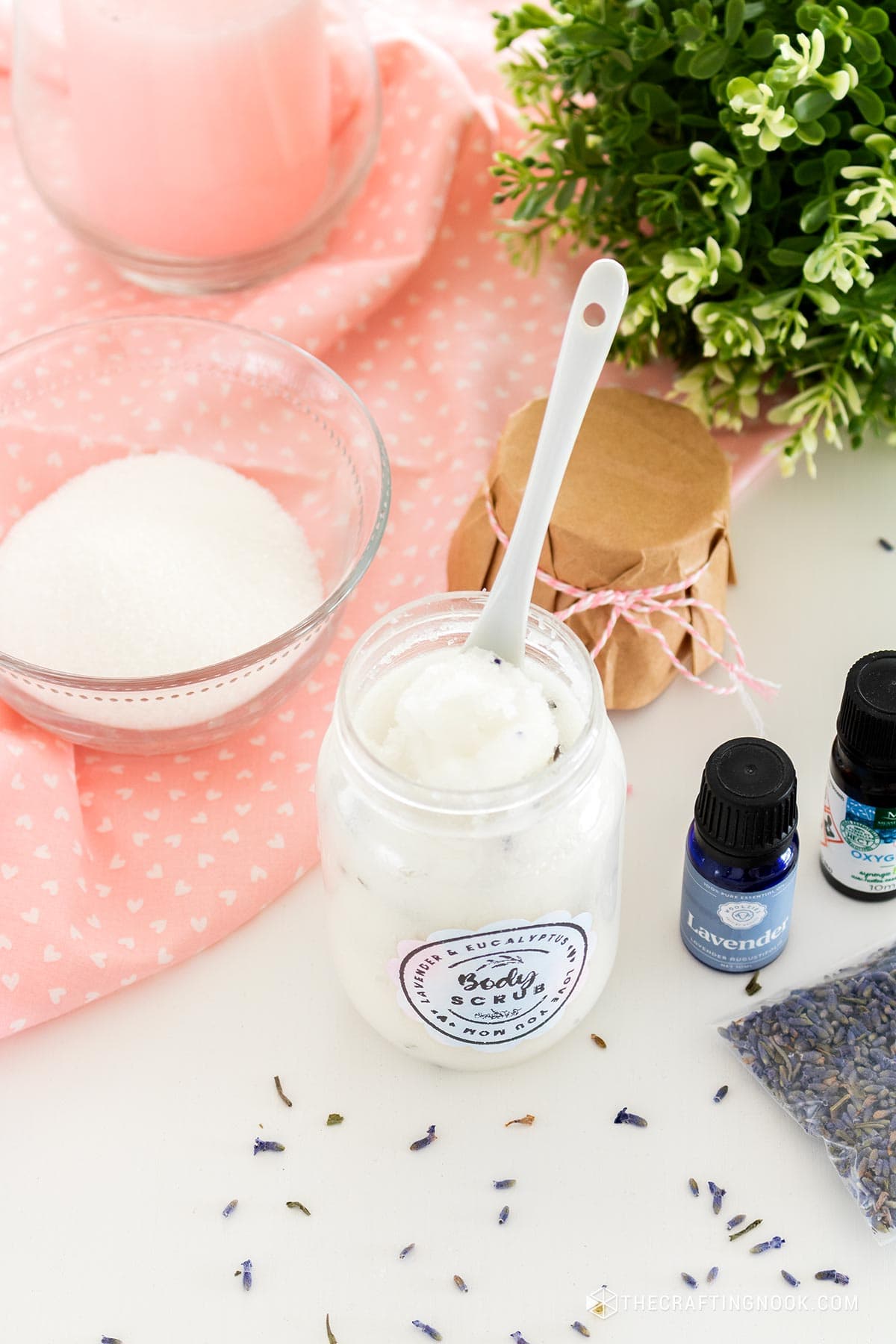 overhead view of teh Eucalyptus Lavender Sugar Scrub Recipe in the jar with a spoon