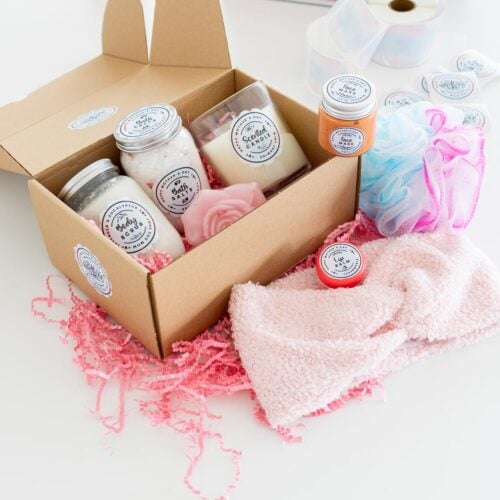 Relaxing DIY Spa Kit in a cute box include bath salts, sugar scrub, face mask, lip balm, scented candles, spong and a headband. for Mother's Day Featured image