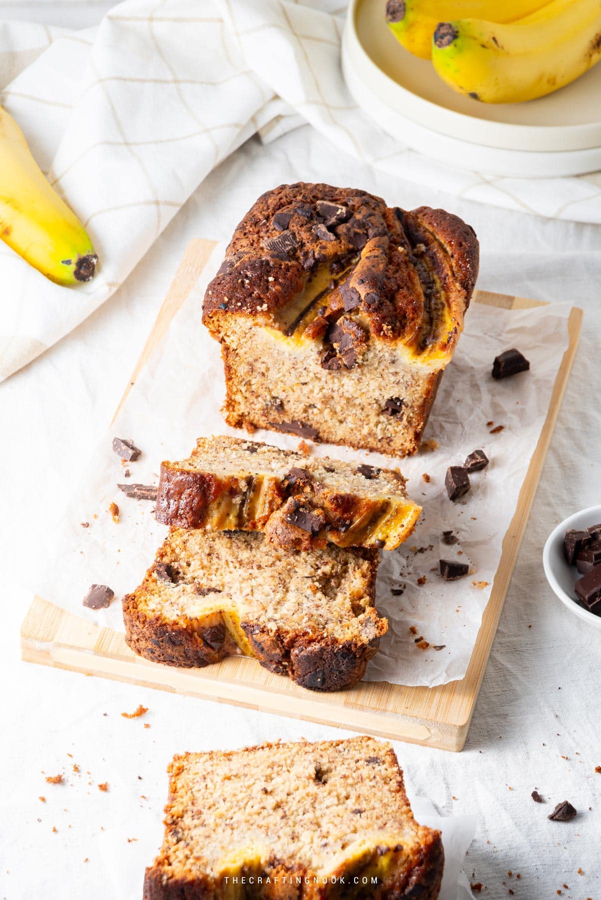 Chocolate Chunk Banana Bread Recipe Without Butter sliced on a chopping board Cover image