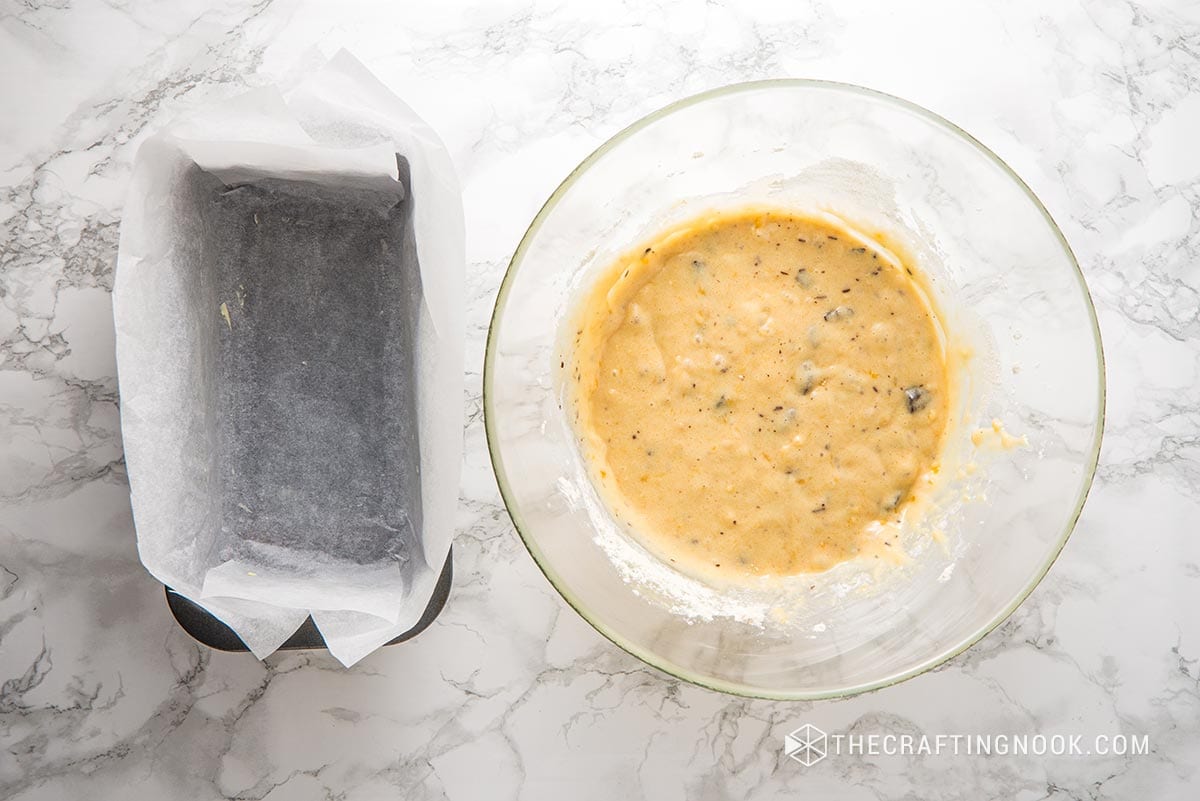 top view of the entire mixture and a rectangular baking mold with baking paper
