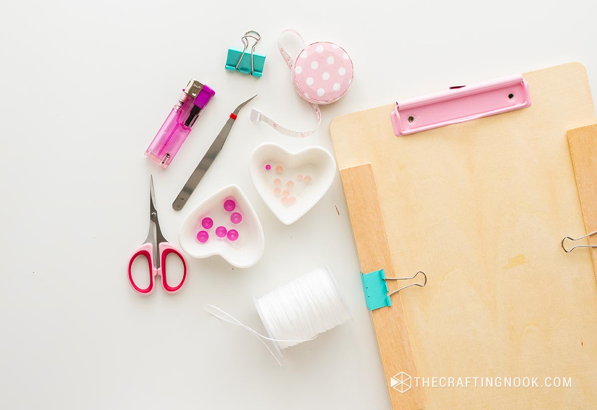 overhead photo of the supplies needed for the Macrame Bracelet With Beads